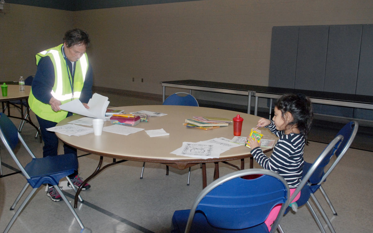 Shelter team worker and child